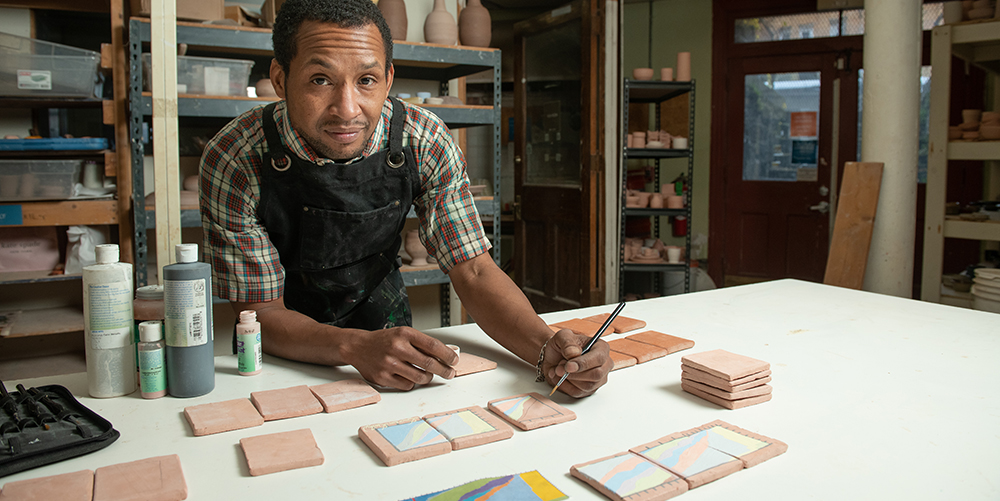 In the ceramic studio with Deavron "The Urban Explorer" Dailey. March 2021. (Photo credit: Nathan Shaulis.)