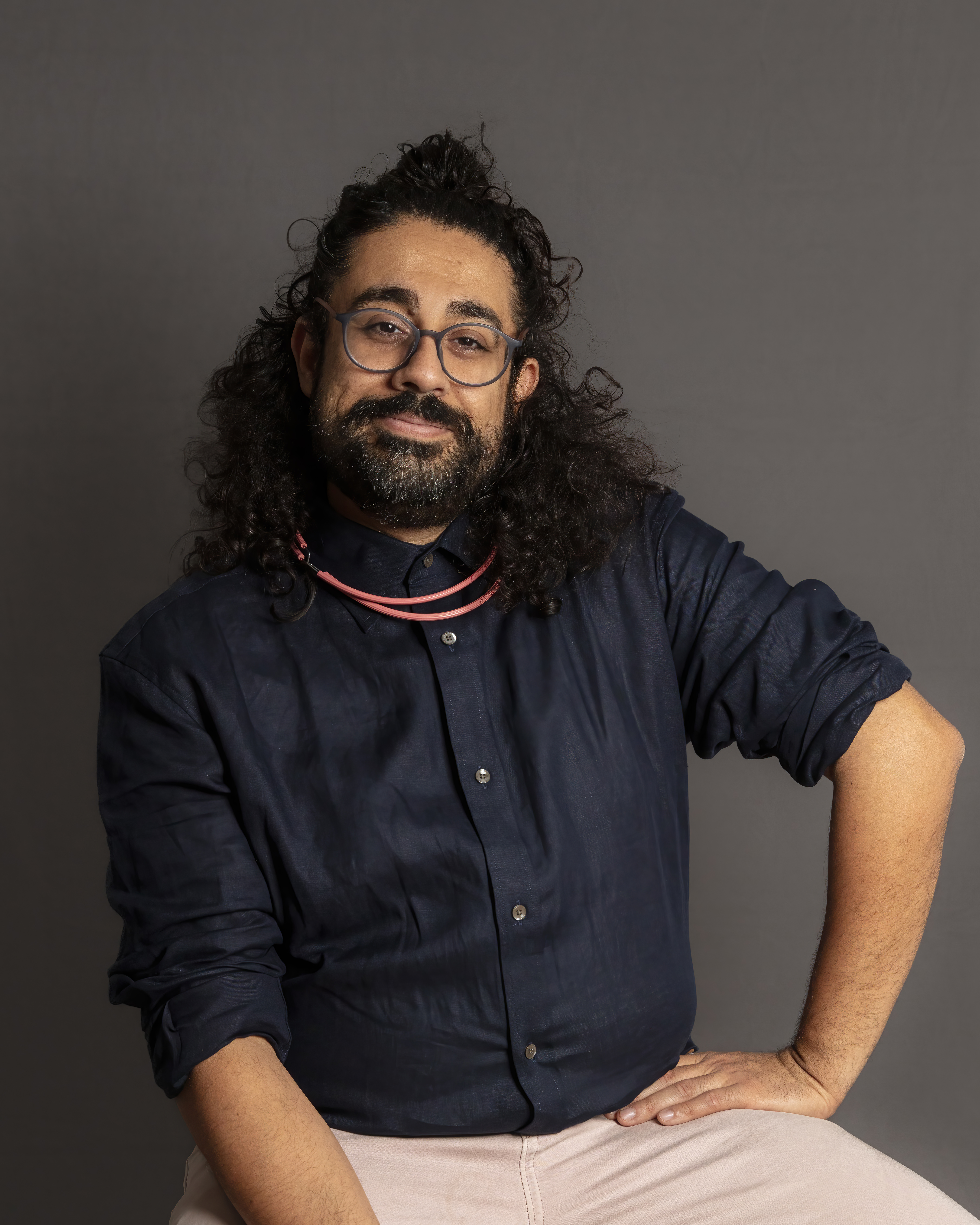 Headshot of Adil Mansoor.