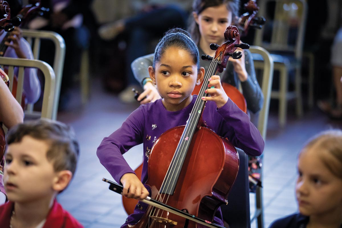 (L–R) Samuel Stephenson, Ariana Taylor, Anna Gredler and Kiki Lagorio are Suzuki cello students with instructor Beth Goldstein-McKee at Hope Academy of Music and the Arts. The after-school arts education outreach program is using a grant from the Mac Miller Fund to double the size of its Suzuki Music Program.