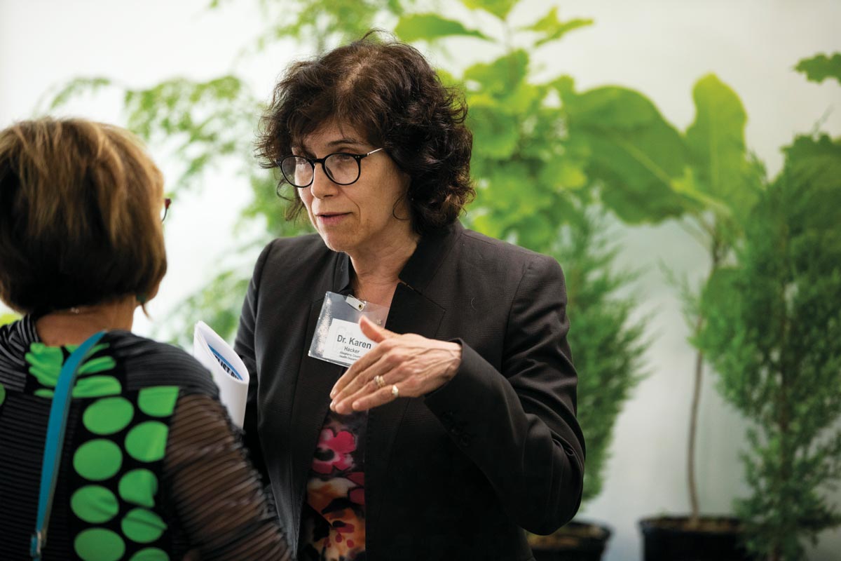 Dr. Karen Hacker, who has transitioned from Allegheny County Health Department director to the Centers for Disease Control, speaks with a Pittsburgh Foundation donor at an Explore Series event this year.