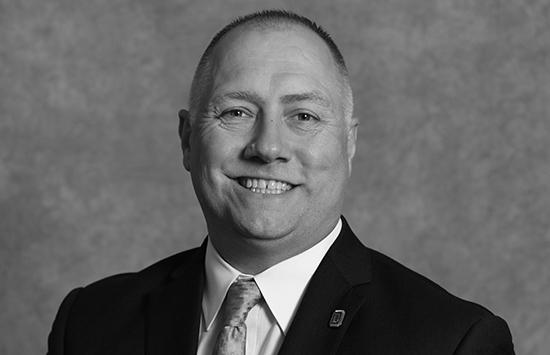 Head shot of Tom Dugas.
