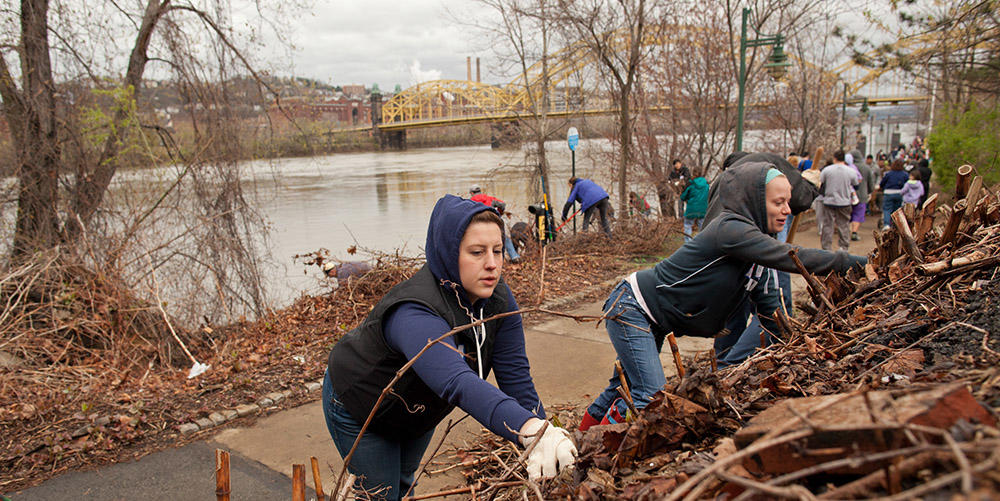 Friends of the Riverfront leads hundreds of volunteers to clean the riverbanks in Pittsburgh.