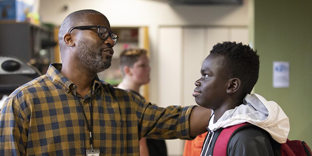 Floyd Faulkner, Quaker Valley School District’s community youth worker, talks with a student at the Sewickley YMCA, an organization that was one of the first grant recipients from the Raymond and Martha Suckling Fund.