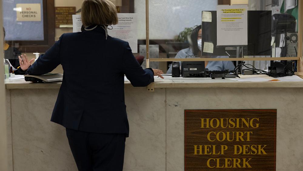 Attorney Dianne S. Wainwright, deputy court administrator, Allegheny County Court of Common Pleas, Civil Division, stands at the Housing Court Help Desk, which is funded by The Pittsburgh Foundation.