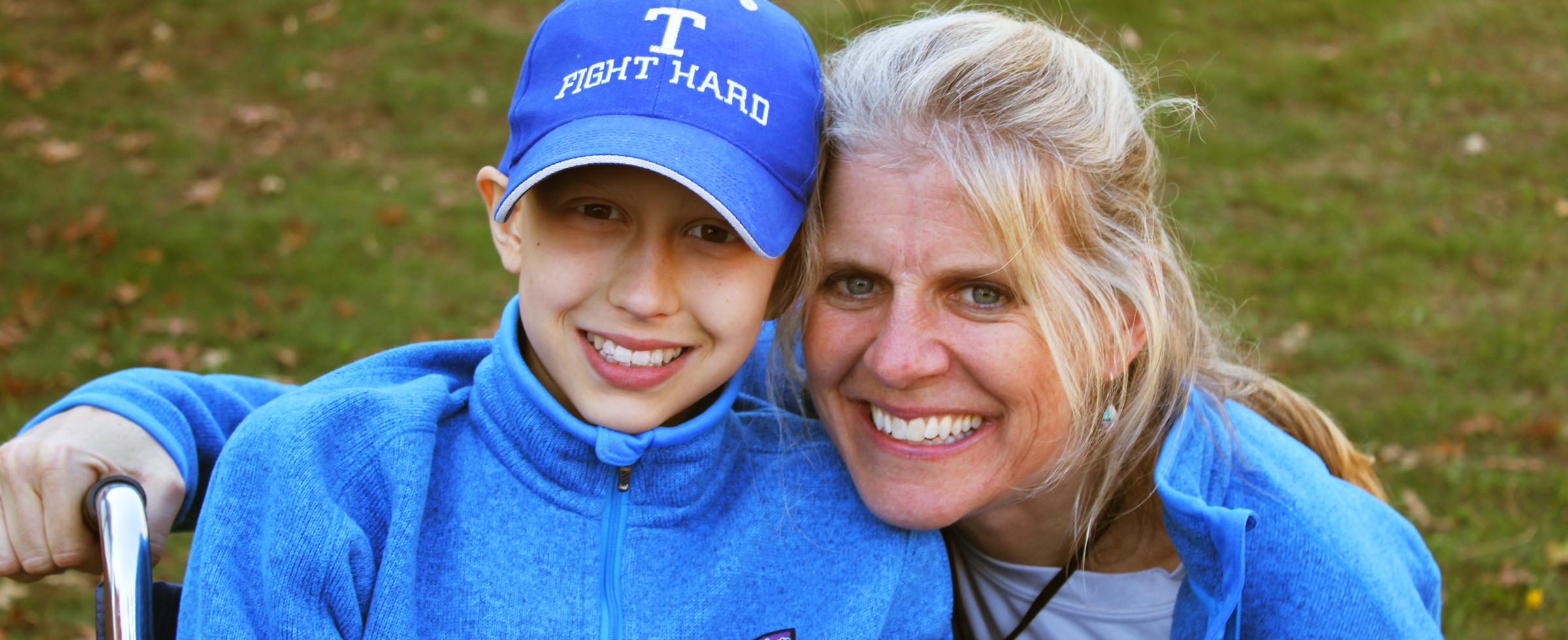 Maggie Elder celebrates with mom, Cyndi McGinnis, at a 2011 5K race fundraiser held in her honor four months after she was diagnosed with Ewing’s sarcoma. After Maggie’s death in February 2012, the family used money raised to establish the Miracles from Maggie Fund at The Community Foundation of Westmoreland County.