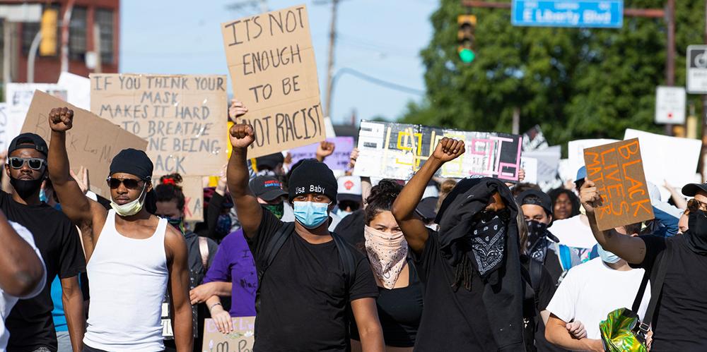 Protesters march June 1, 2020 in Pittsburgh's East Liberty neighborhood, demonstrating against racist violence by police. Image by Joshua Franzos for The Pittsburgh Foundation.